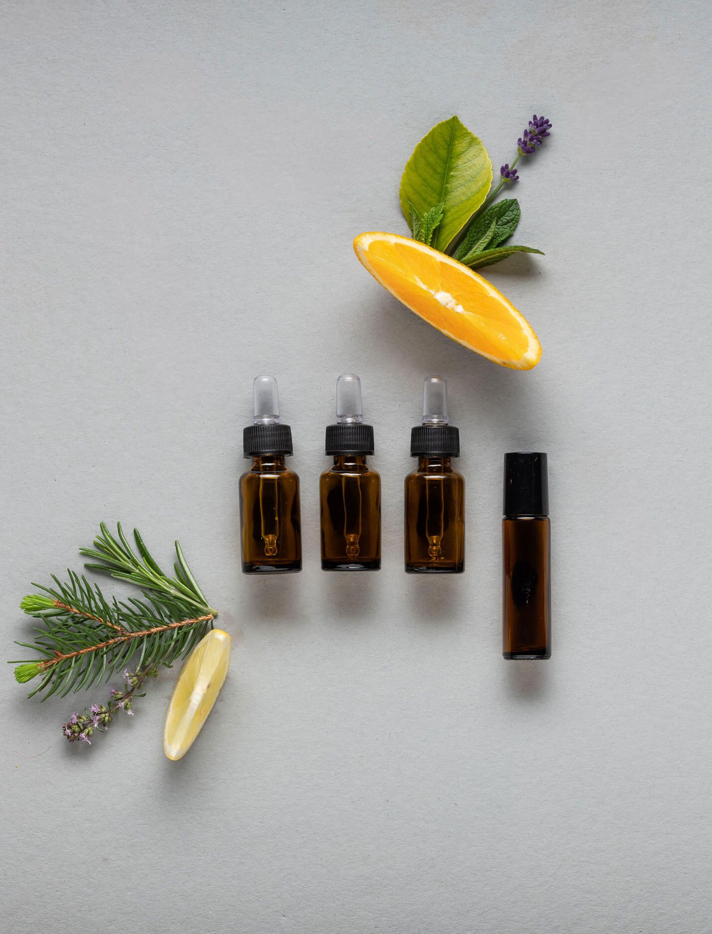 Our products - drops & oils with lemon & orange - vertical format - Schlossapotheke Welsberg